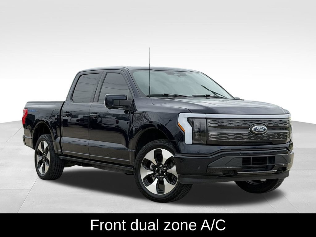 Used 2023 Ford F-150 Lightning Platinum with VIN 1FT6W1EV0PWG11317 for sale in Carrollton, TX