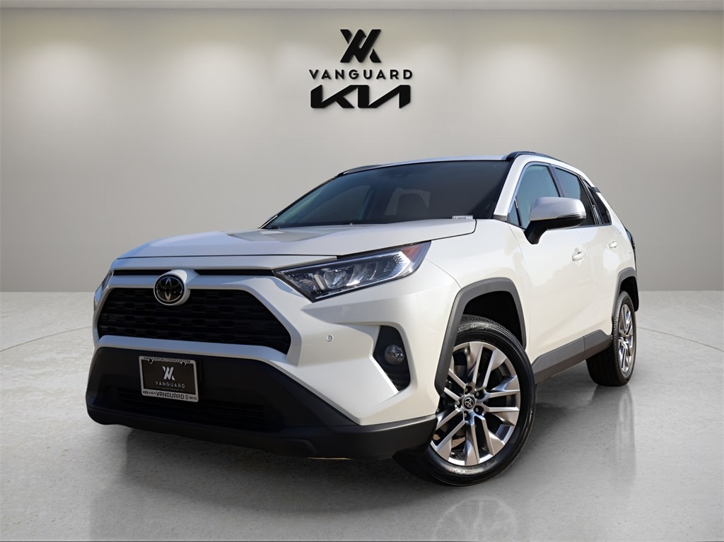 Used 2021 Toyota RAV4 XLE Premium with VIN 2T3C1RFV6MW149063 for sale in Arlington, TX