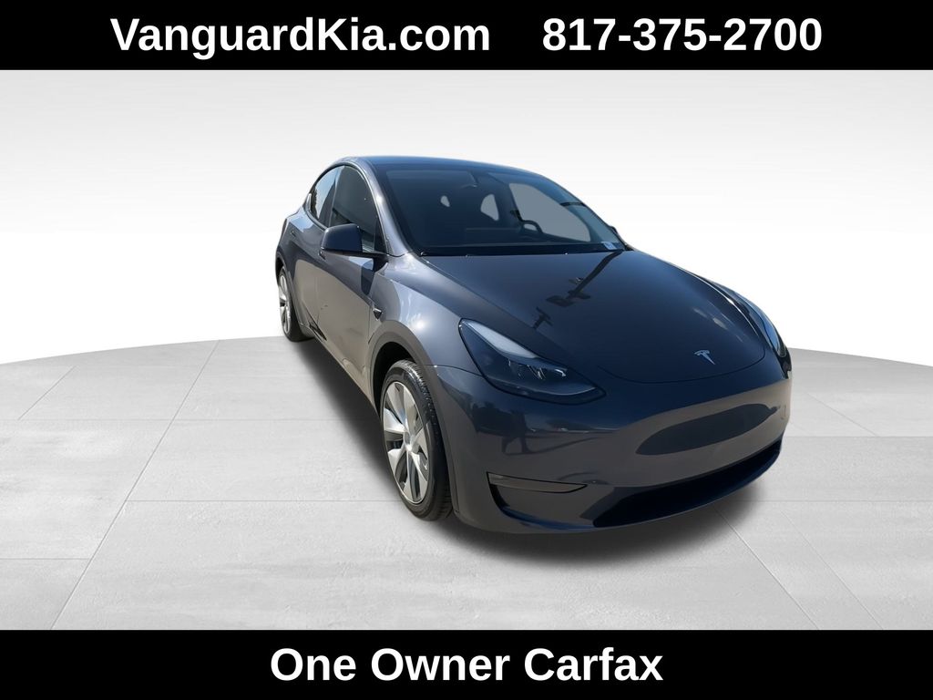 Used 2023 Tesla Model Y Base with VIN 7SAYGDED0PF943912 for sale in Arlington, TX