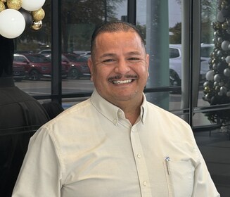 Staff member Rogelio Olivo from ID_4c7294