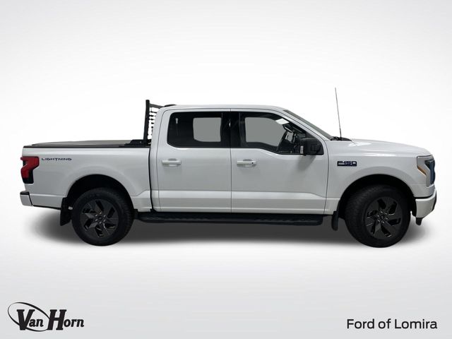Used 2024 Ford F-150 Lightning Flash with VIN 1FT6W3L78RWG05557 for sale in Lomira, WI