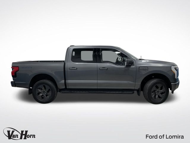 Used 2022 Ford F-150 Lightning Lariat with VIN 1FTVW1EL9NWG00453 for sale in Lomira, WI