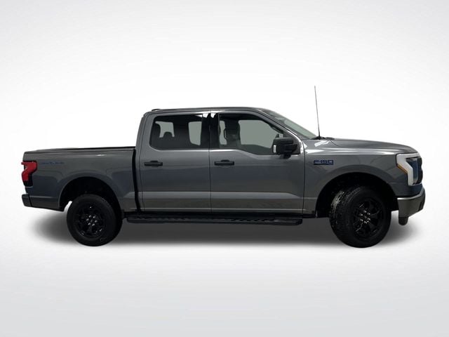 Used 2025 Ford F-150 Lightning XLT with VIN 1FTVW3LK9SWG13771 for sale in Lomira, WI