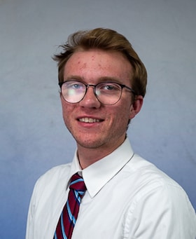 Staff member Nicholas Randall from ID_f55bba011169