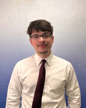 Staff member Logan Wight  from ID_4b4afee829d1