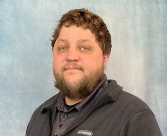 Staff member Collin Mueller from ID_3b9db436a8a0