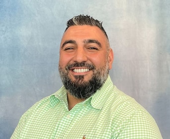 Staff member Ali Mustafa from ID_3b9db436a8a0