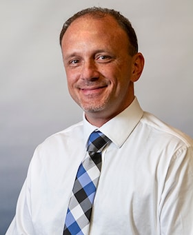 Staff member Joseph Glenetske from ID_526160c74a76