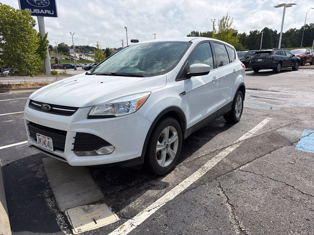 Used 2016 Ford Escape SE with VIN 1FMCU0G97GUC58214 for sale in Kansas City