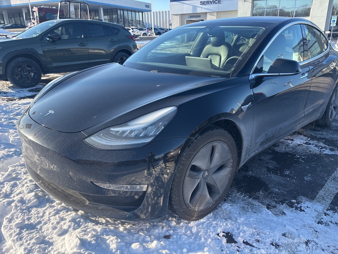 Used 2019 Tesla Model 3 Base with VIN 5YJ3E1EAXKF416082 for sale in Gladstone, MO