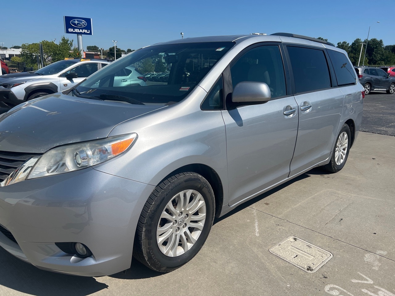 Used 2016 Toyota Sienna XLE with VIN 5TDYK3DC7GS705100 for sale in Kansas City, MO