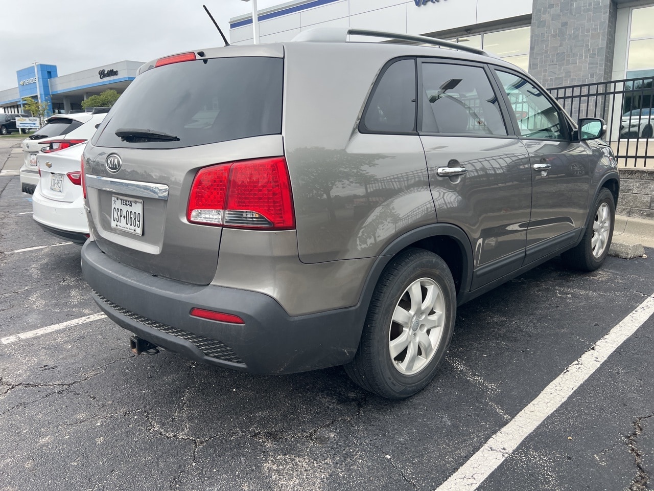 Used 2013 Kia Sorento LX with VIN 5XYKT4A28DG402792 for sale in Kansas City