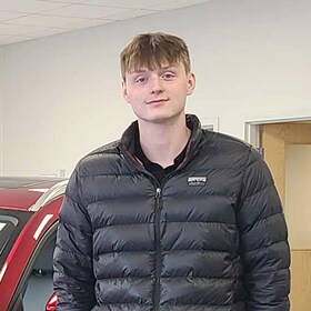 Staff member Alex Thomas from ID_6fe36218e144