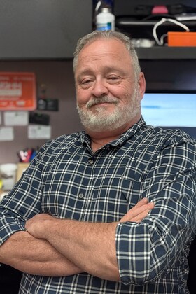 Staff member Joseph Bennett from ID_46bc71c4a940