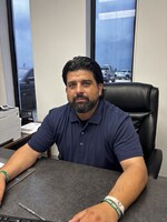 Staff member Sam Lacombe from ID_49bc58