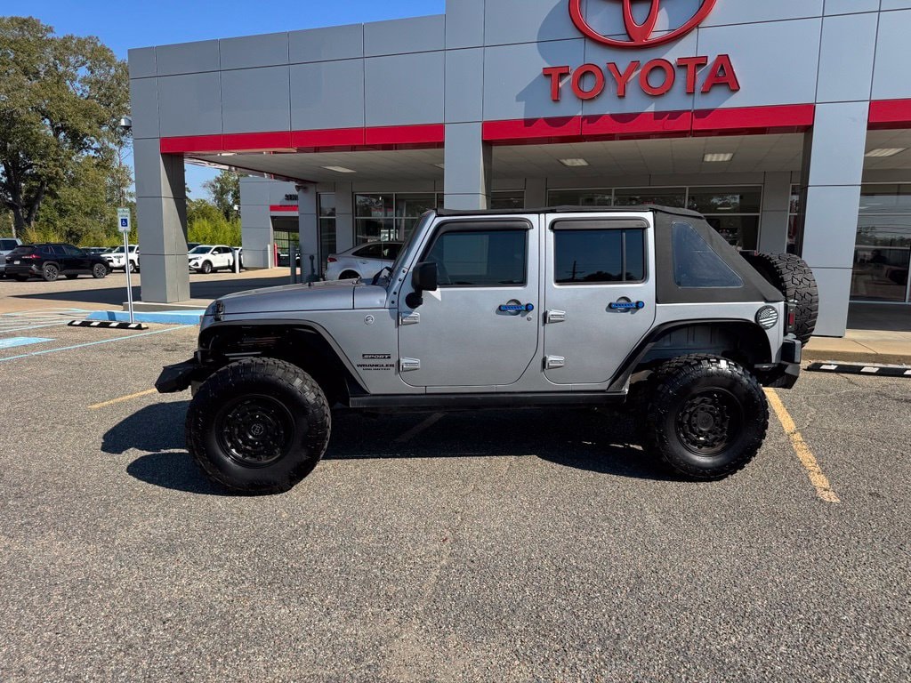Used 2016 Jeep Wrangler Unlimited Sport with VIN 1C4BJWDG5GL221876 for sale in Bastrop, LA