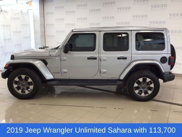 Used 2019 Jeep Wrangler Unlimited Sahara with VIN 1C4HJXEG3KW651038 for sale in Morris, Minnesota