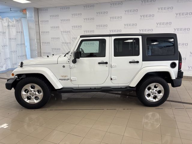 Used 2015 Jeep Wrangler Unlimited Sahara with VIN 1C4BJWEG0FL709419 for sale in Morris, Minnesota