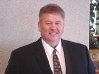 Staff member Eric Simonson from 57159e7fc741