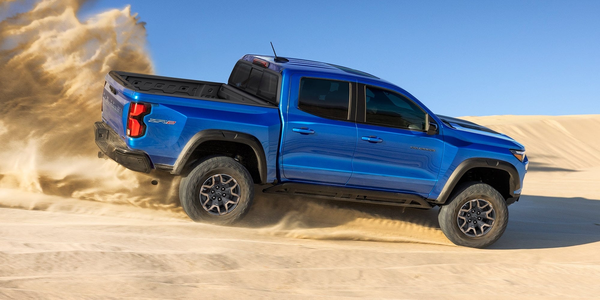 Blue 2026 Chevy Colorado off-roading