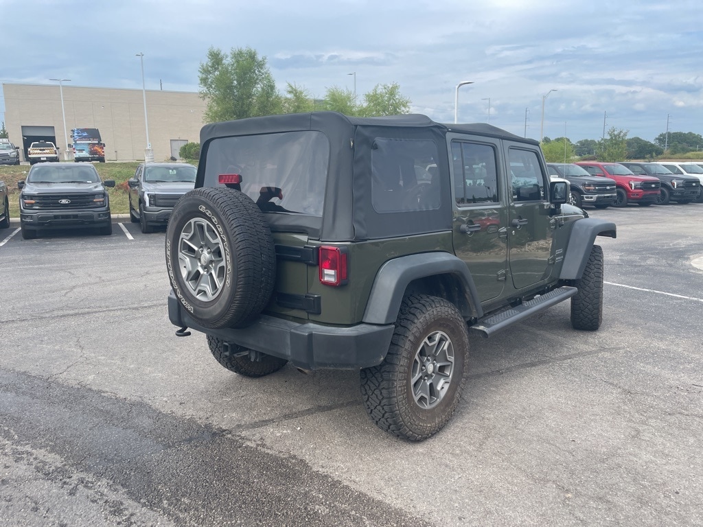 Used 2015 Jeep Wrangler Unlimited Sport with VIN 1C4BJWDG3FL740732 for sale in Kansas City