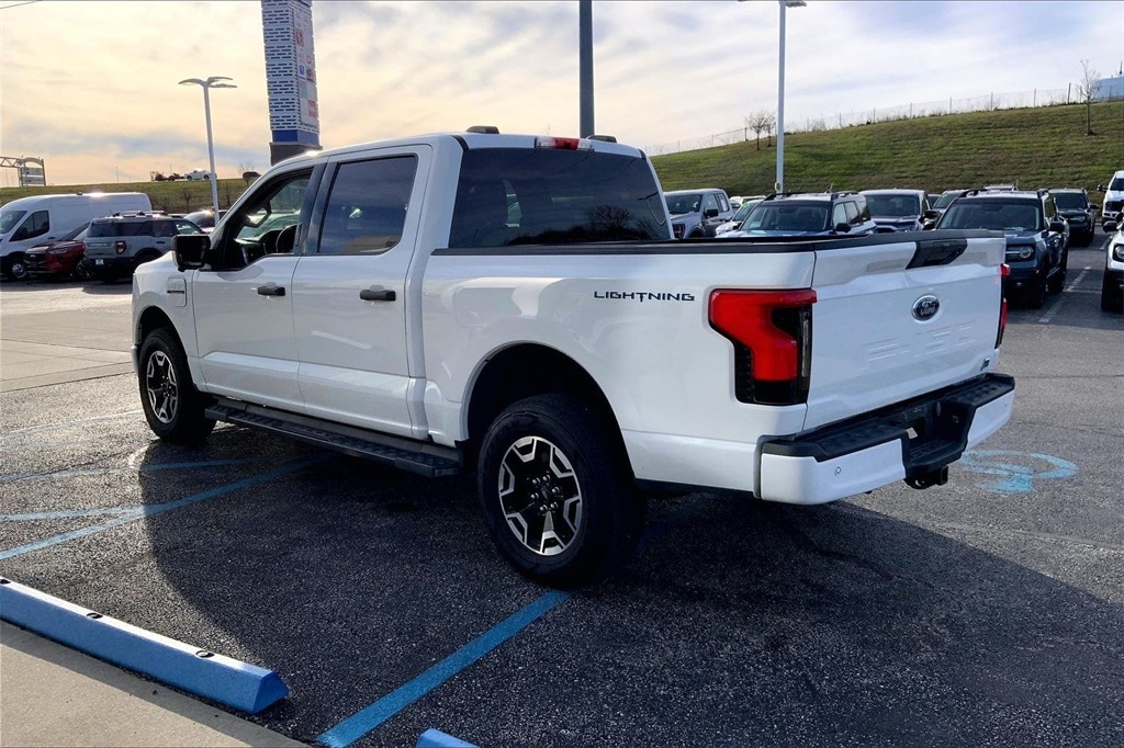 Used 2023 Ford F-150 Lightning XLT with VIN 1FTVW1ELXPWG38969 for sale in Kansas City, KS
