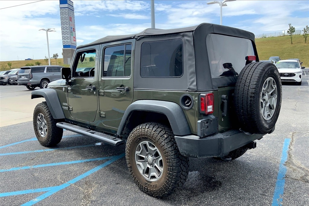 Used 2015 Jeep Wrangler Unlimited Sport with VIN 1C4BJWDG3FL740732 for sale in Kansas City