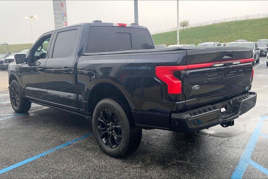 Used 2023 Ford F-150 Lightning Lariat with VIN 1FTVW1EV6PWG07476 for sale in Kansas City, KS