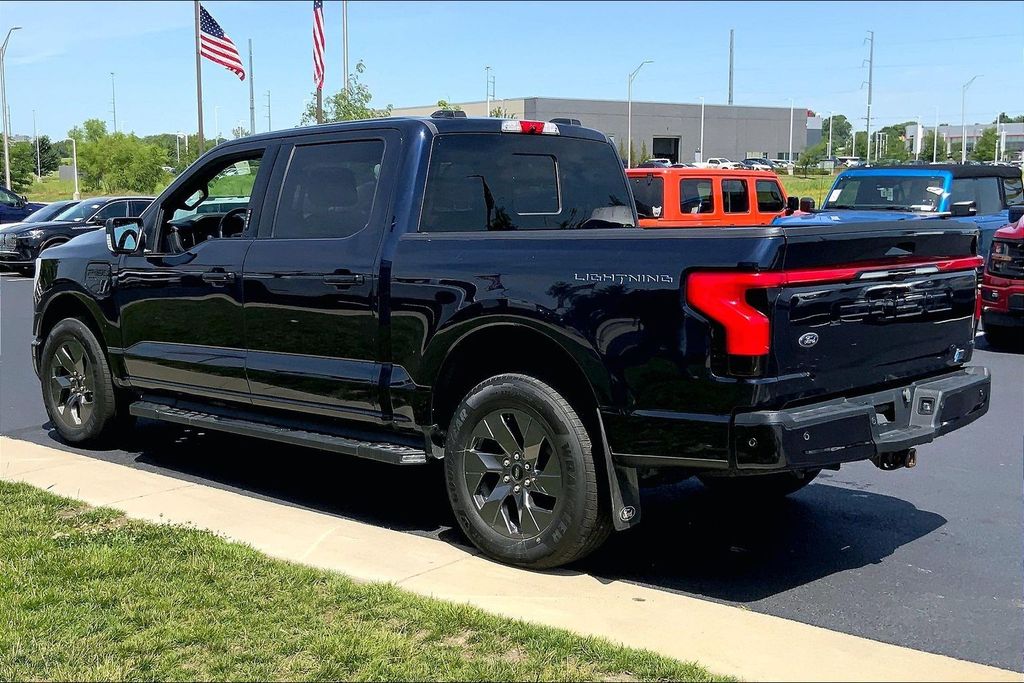 Used 2023 Ford F-150 Lightning Lariat with VIN 1FT6W1EV0PWG62817 for sale in Kansas City, KS