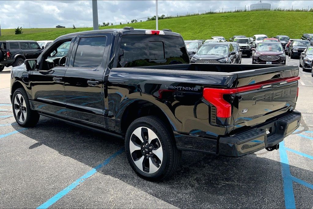 Used 2025 Ford F-150 Lightning Platinum with VIN 1FT6W7L72SWG06619 for sale in Kansas City, KS