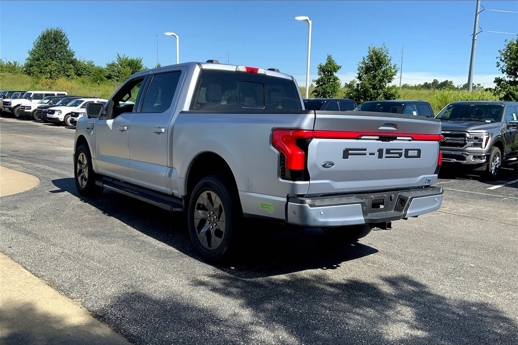 Used 2022 Ford F-150 Lightning Lariat with VIN 1FT6W1EV6NWG01162 for sale in Kansas City, KS