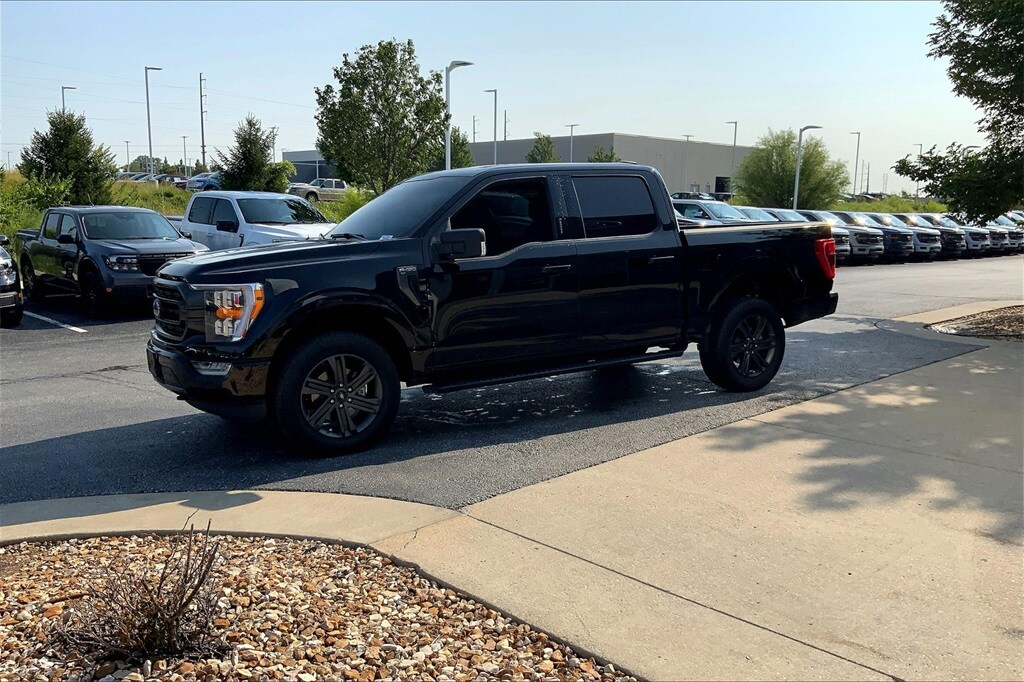 Used 2023 Ford F-150 XLT with VIN 1FTFW1E8XPKE37886 for sale in Kansas City