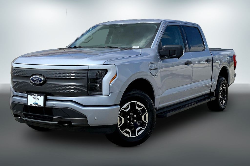 Used 2022 Ford F-150 Lightning XLT with VIN 1FTVW1EL5NWG06685 for sale in Kansas City, KS