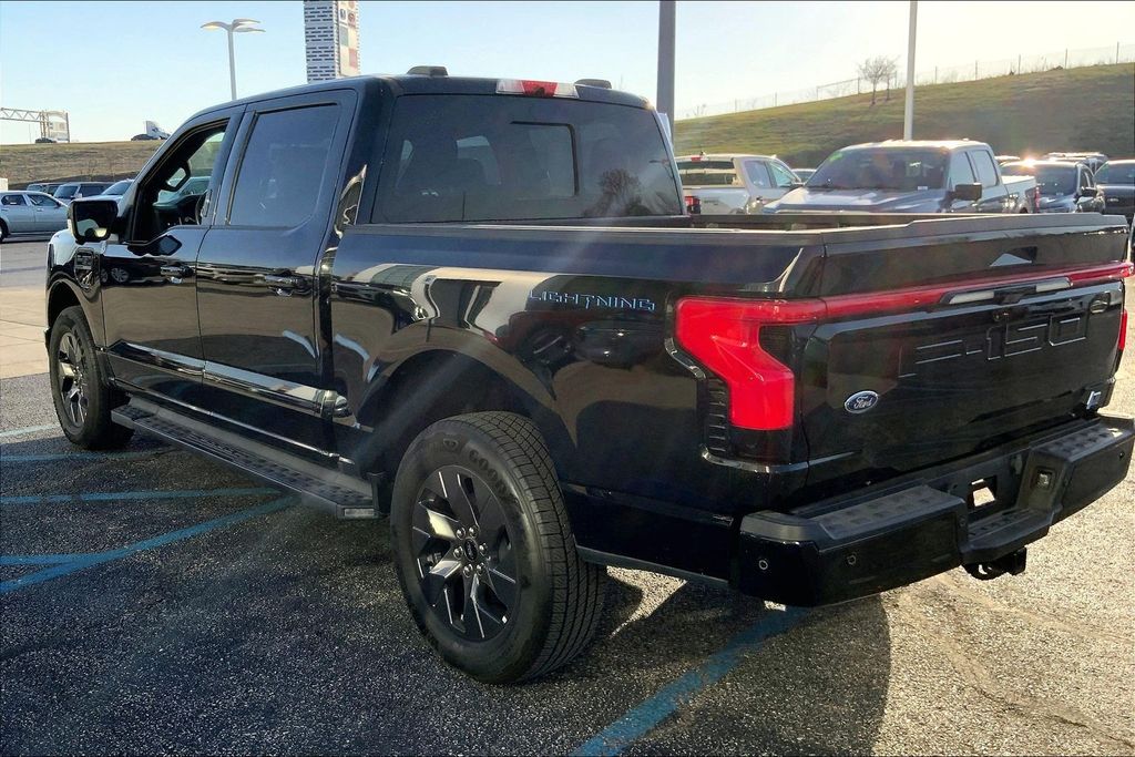 Used 2023 Ford F-150 Lightning Lariat with VIN 1FT6W1EVXPWG60802 for sale in Kansas City, KS