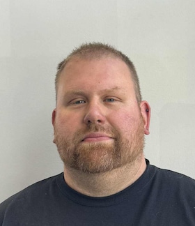 Staff member Greg Scott from a5e54106e616