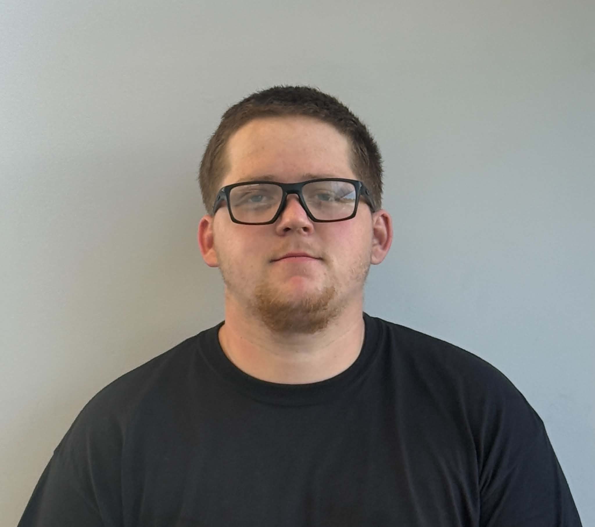 Staff member Caleb Neely from a5e54106e616