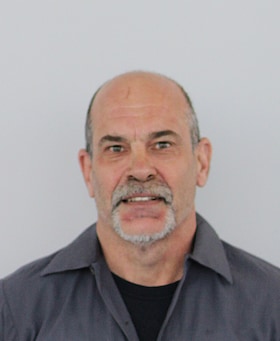 Staff member John Naegele from a5e54106e616