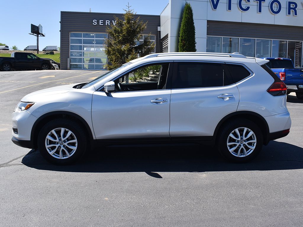 Used 2017 Nissan Rogue SV with VIN KNMAT2MV9HP599965 for sale in Dyersville, IA