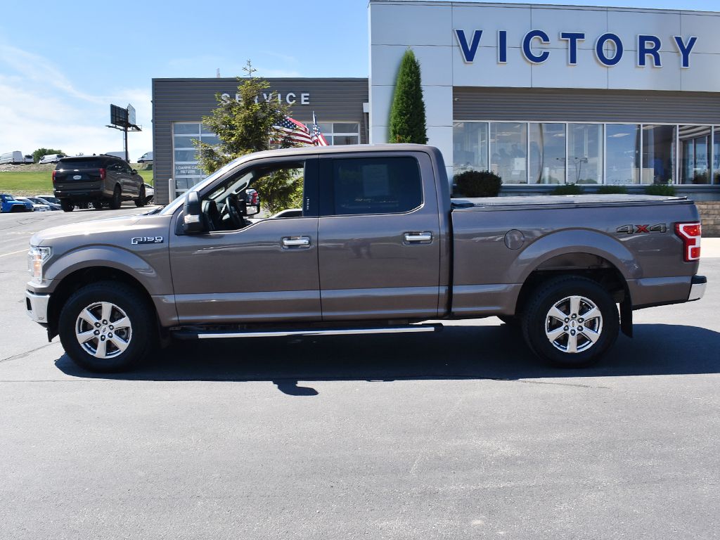 Used 2019 Ford F-150 XLT with VIN 1FTFW1E59KKD27345 for sale in Dyersville, IA