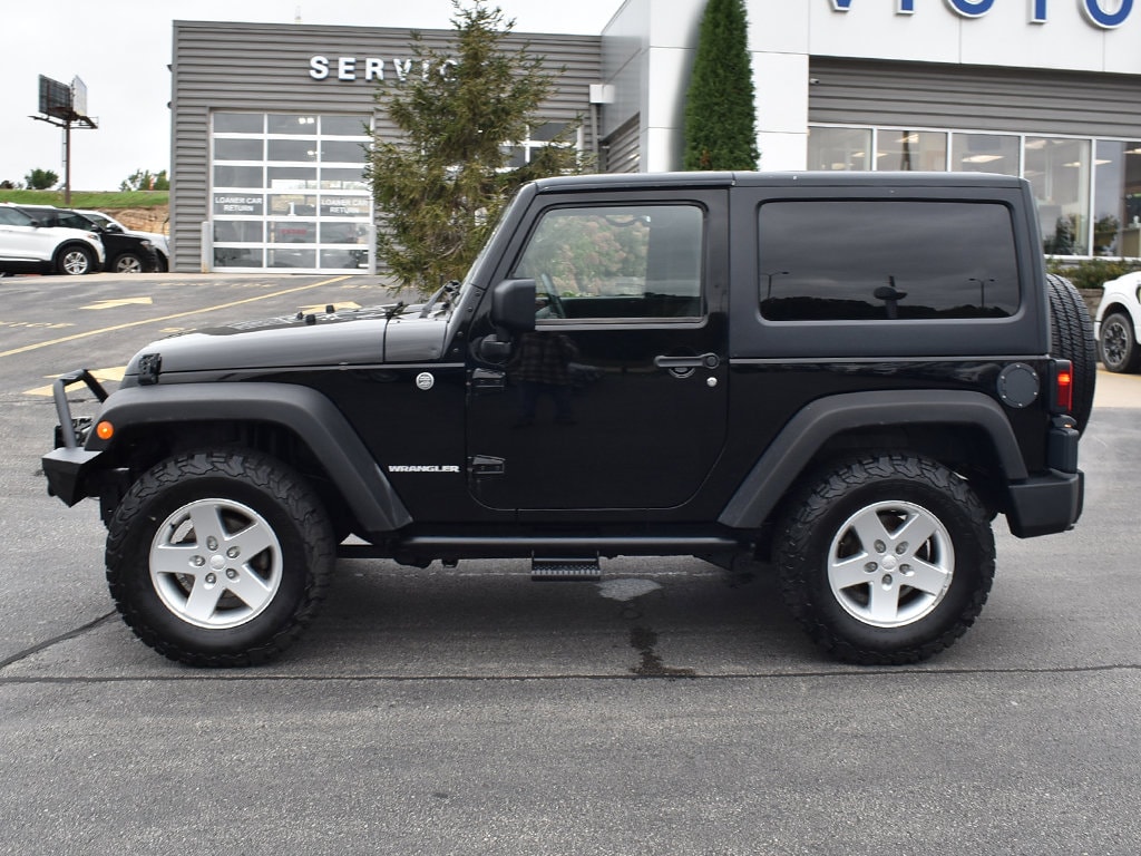 Used 2011 Jeep Wrangler Sport with VIN 1J4AA2D16BL553067 for sale in Dyersville, IA