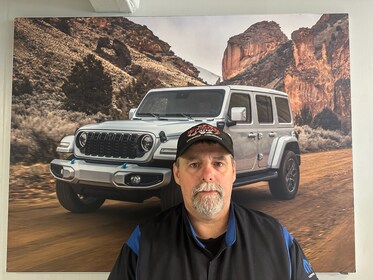 Staff member Ken Parmenter from 56fdfbb9bbaf