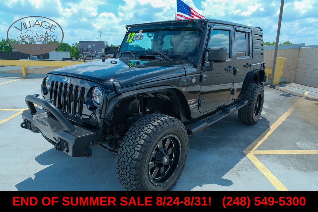 Used 2012 Jeep Wrangler Unlimited Sahara with VIN 1C4BJWEG2CL223027 for sale in Royal Oak, MI