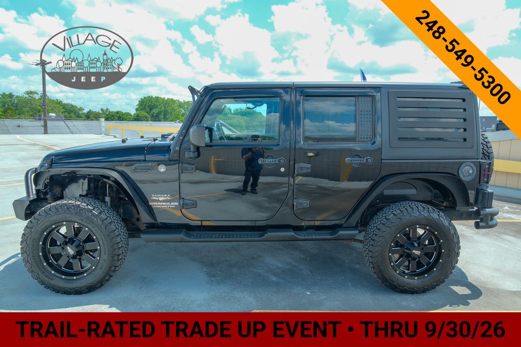 Used 2012 Jeep Wrangler Unlimited Sahara with VIN 1C4BJWEG2CL223027 for sale in Royal Oak, MI