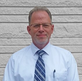 Staff member Tom Poorman from ba933dc87760
