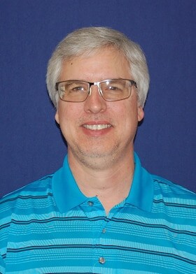 Staff member Tim from ID_b74926
