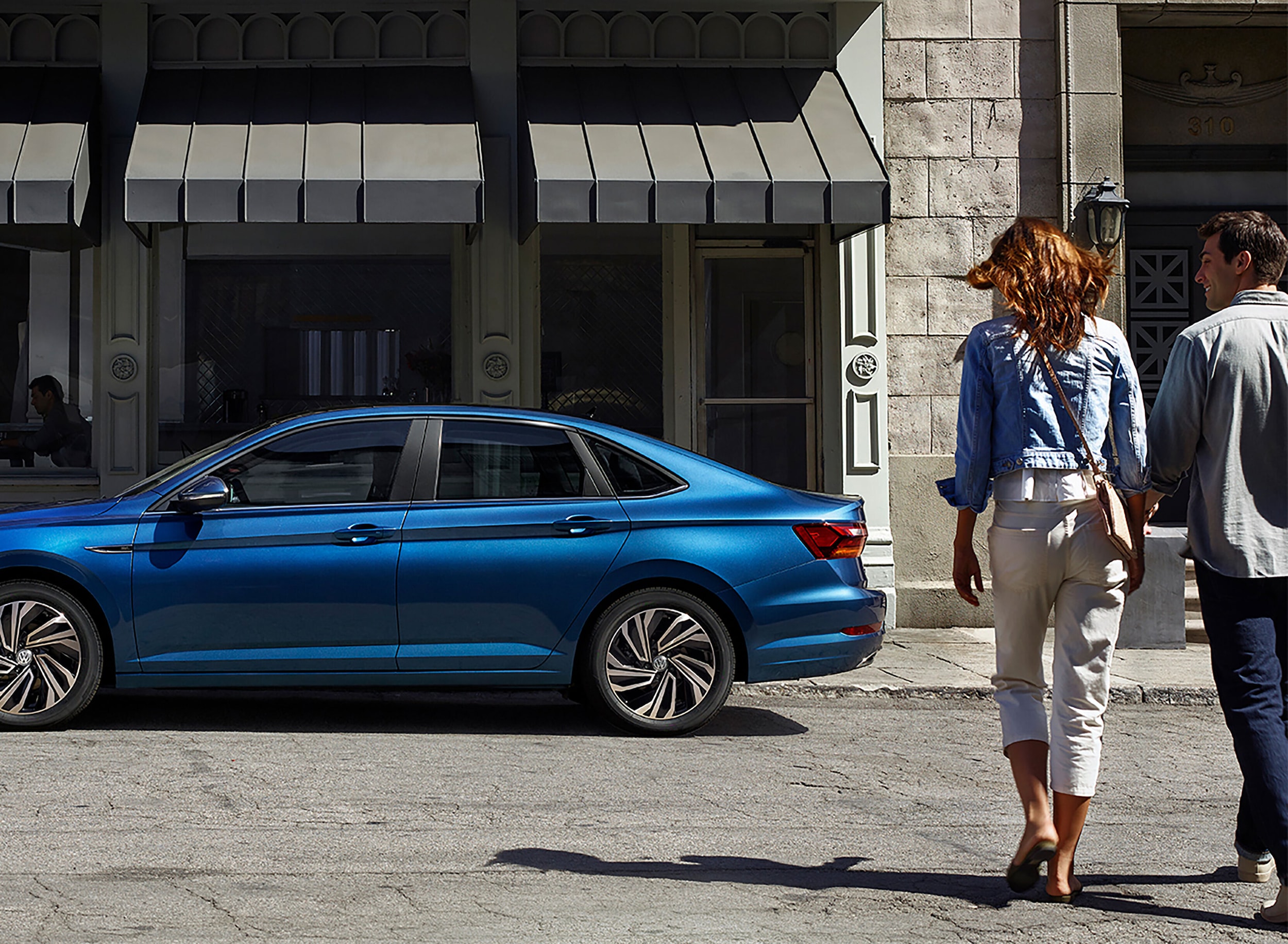  Couple walking towards vehicle