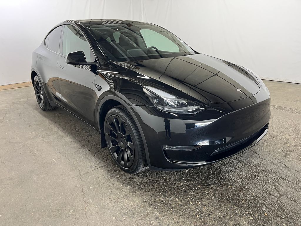 Used 2024 Tesla Model Y Long Range with VIN 7SAYGDEEXRA217953 for sale in Kirkland, WA