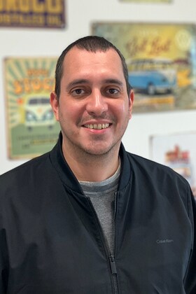 Staff member Andrew Rodrigues from ID_493d3ed2b794