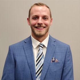 Staff member Justin Dennis from ID_38481463a092