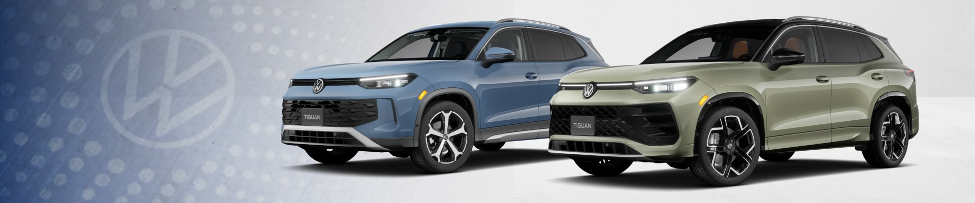 Two new 2026 Volkswagen Tiguan SUVs parked in front of a superimposed Volkswagen logo backdrop